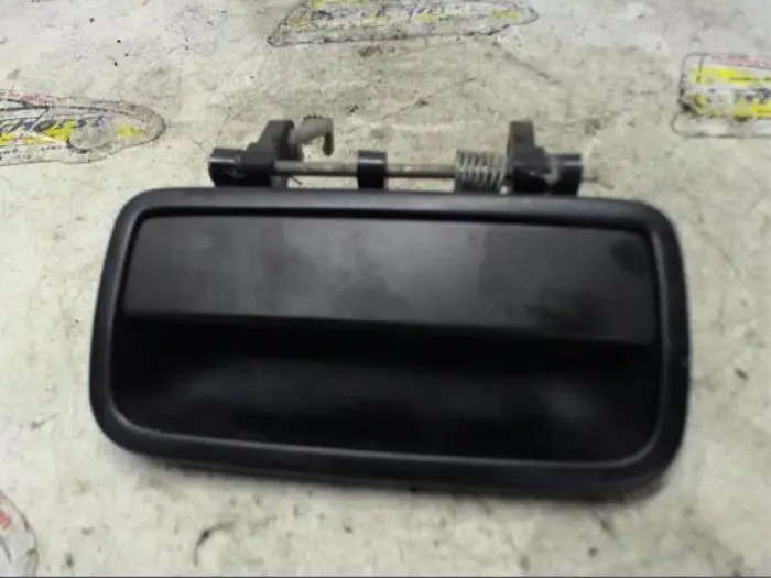 Rear door handle 4-door, right Daihatsu Charade