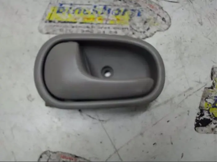 Rear door handle 4-door, left Mazda Demio