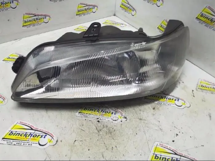 Headlight, left Peugeot 306