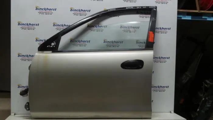 Door 4-door, front left Mazda 323