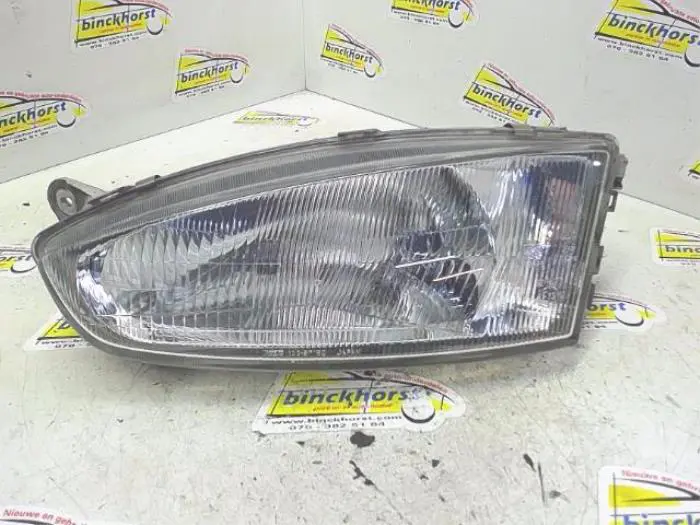 Headlight, left Mitsubishi Colt