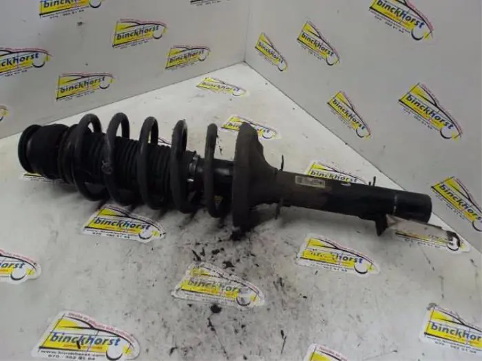 Front shock absorber rod, left Skoda Octavia