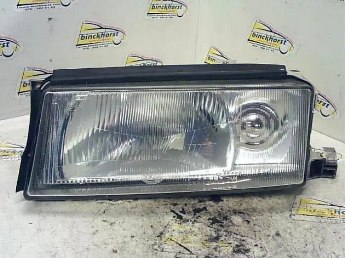 Headlight, left Skoda Octavia