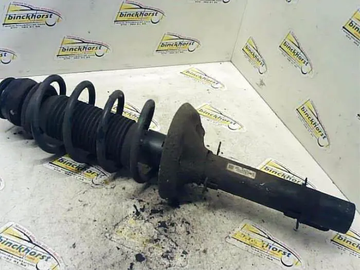 Front shock absorber rod, left Skoda Octavia