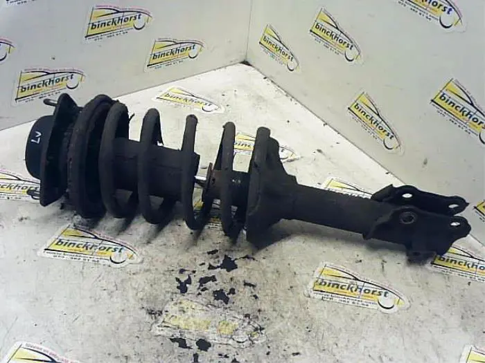 Schokdemperpoot links-voor Hyundai Excel