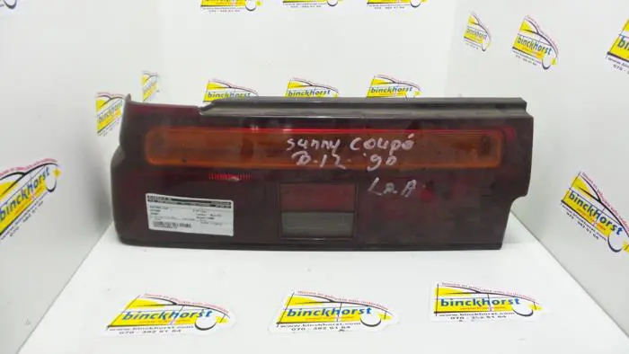 Taillight, left Nissan Sunny