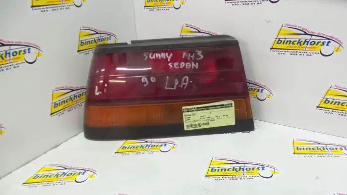 Taillight, left Nissan Sunny