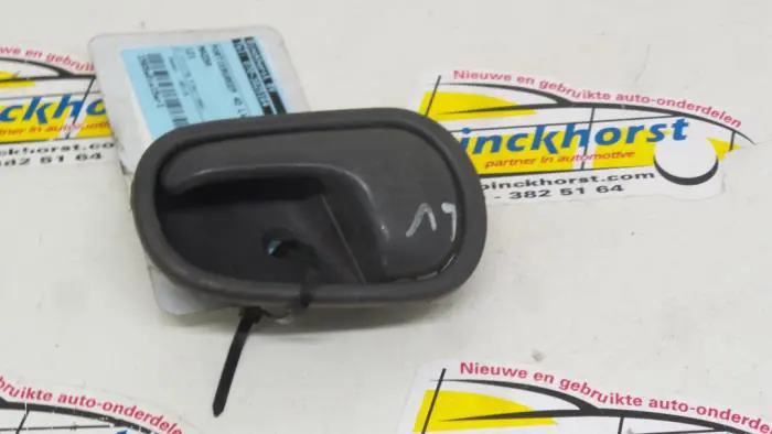 Door handle 4-door, front left Mazda 121