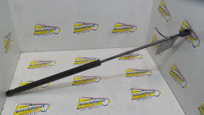 Rear gas strut, left Mazda 121