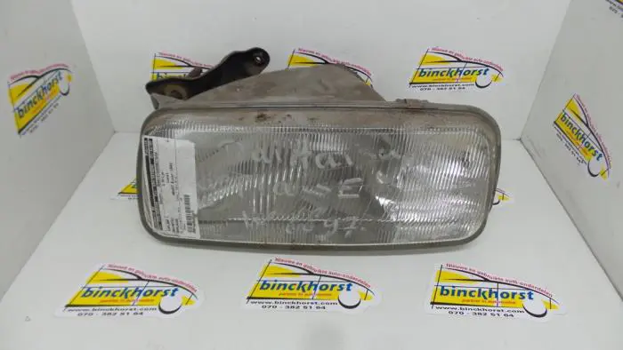 Headlight, left Daihatsu Applause