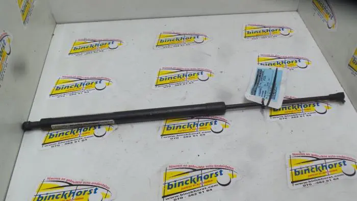 Rear gas strut, left Nissan Primera