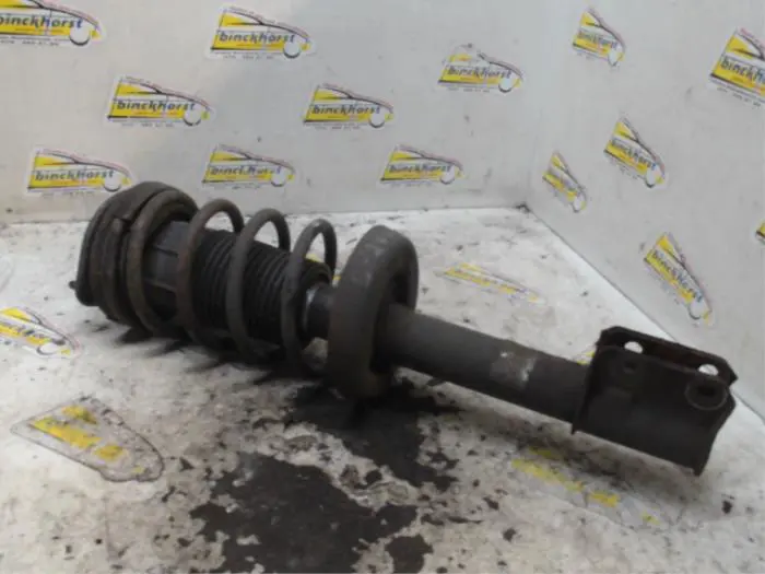 Front shock absorber rod, left Opel Corsa