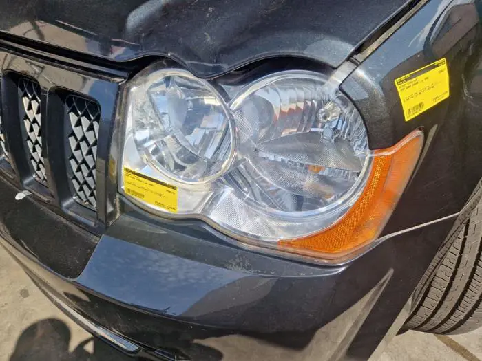 Headlight, left Jeep Grand Cherokee