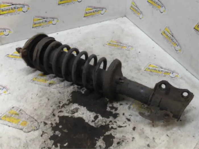 Front shock absorber rod, left Mazda Demio