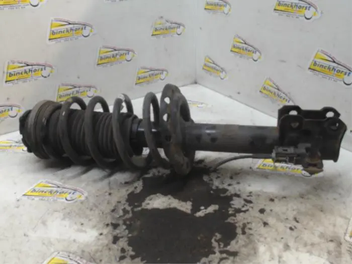 Front shock absorber rod, left Opel Zafira