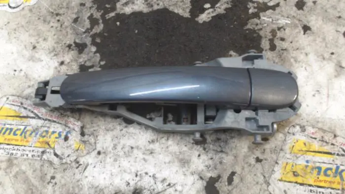 Rear door handle 4-door, left Skoda Fabia