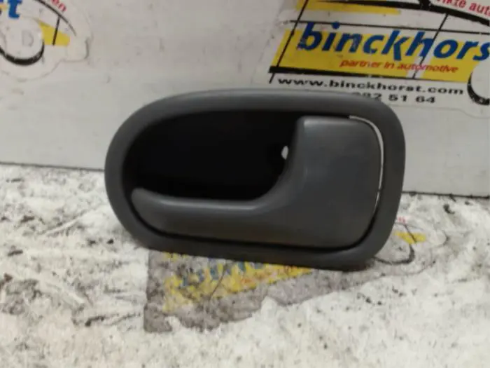 Front door handle 4-door, right Mazda 323F