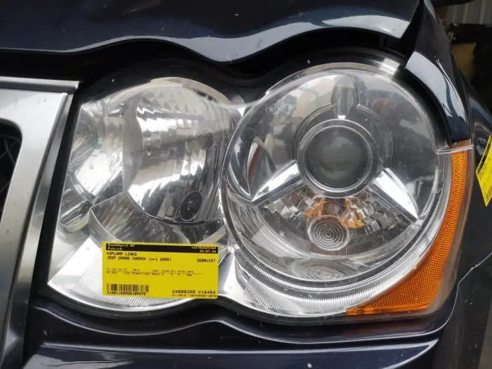 Headlight, left Jeep Grand Cherokee