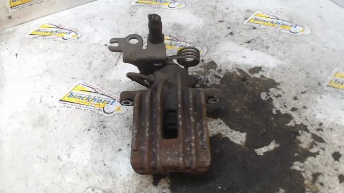 Rear brake calliper, left Volkswagen Caddy