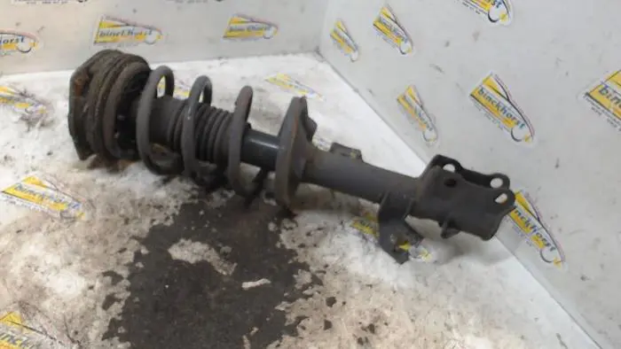 Front shock absorber rod, left Nissan NV200