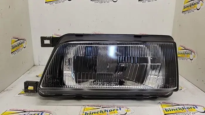 Headlight, left Nissan Sunny