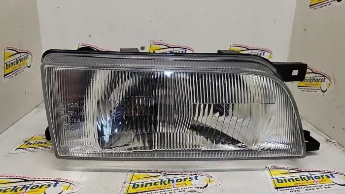 Headlight, right Nissan Sunny