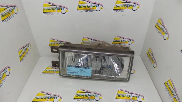 Headlight, left Nissan Bluebird