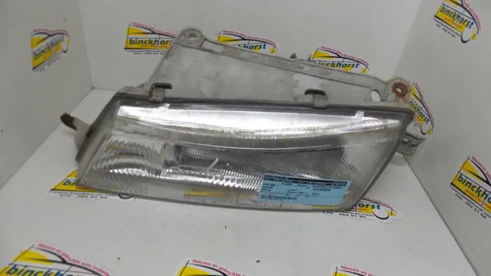 Headlight, left Daewoo Nexia