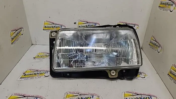 Headlight, left Volkswagen Jetta