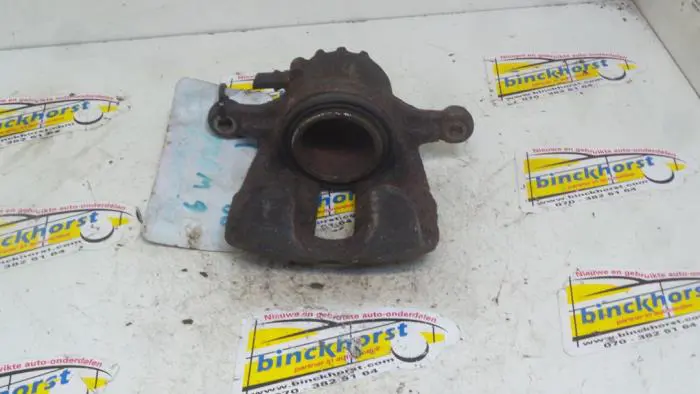 Front brake calliper, left Mitsubishi Carisma